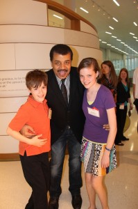 Hallie and Travis with Dr. Neil deGrasse Tyson