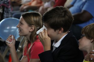 Travis gets emotional at his fifth grade graduation