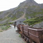 Kelly inspects the rusted mine train